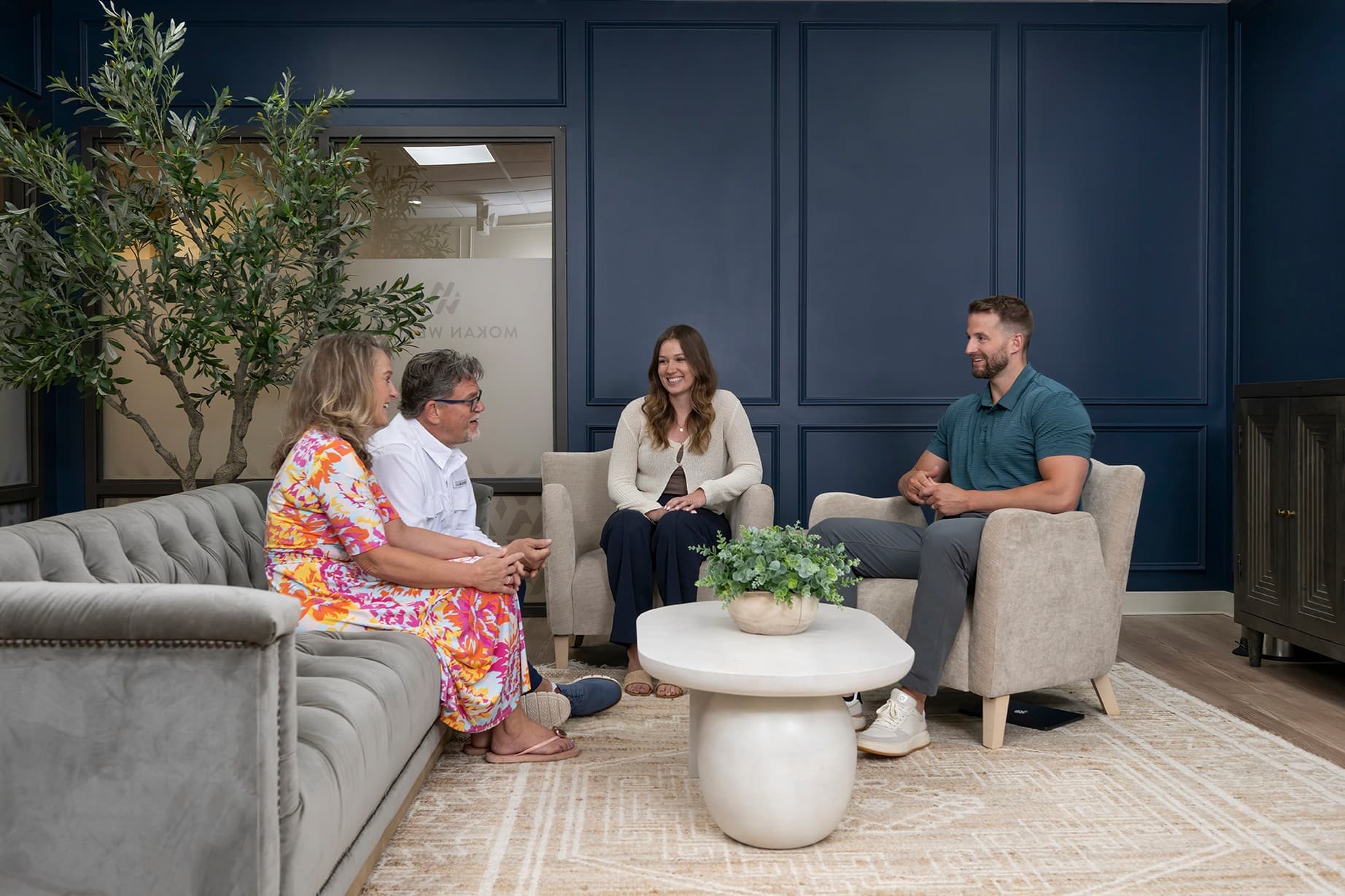 The MOKAN Wealth team meeting with clients